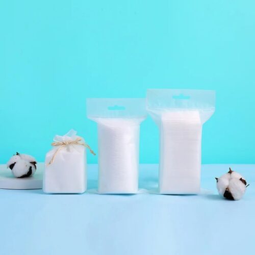 Round Cotton Pads for Makeup Removal – product detail view, non-woven disposable for salons and distributors